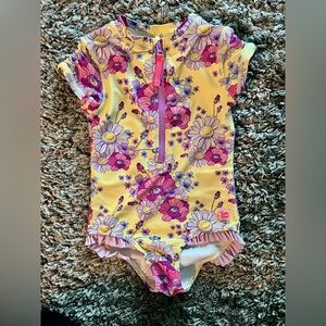 ❤️RuffleButts Yellow Floral Ruffle One-Piece Swimsuit with Pink & Purple Flowers
